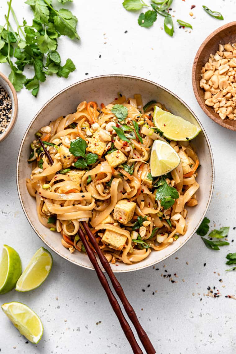 bowl of pad thai with tofu and rice noodles