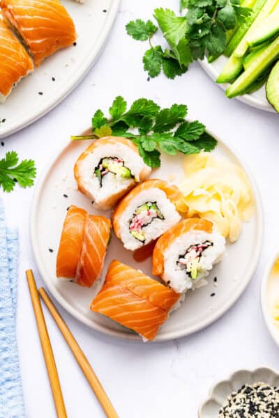 Overhead view of Alaska roll on plate with pickled ginger