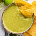 Tomatillo salsa in bowl with tortilla chips