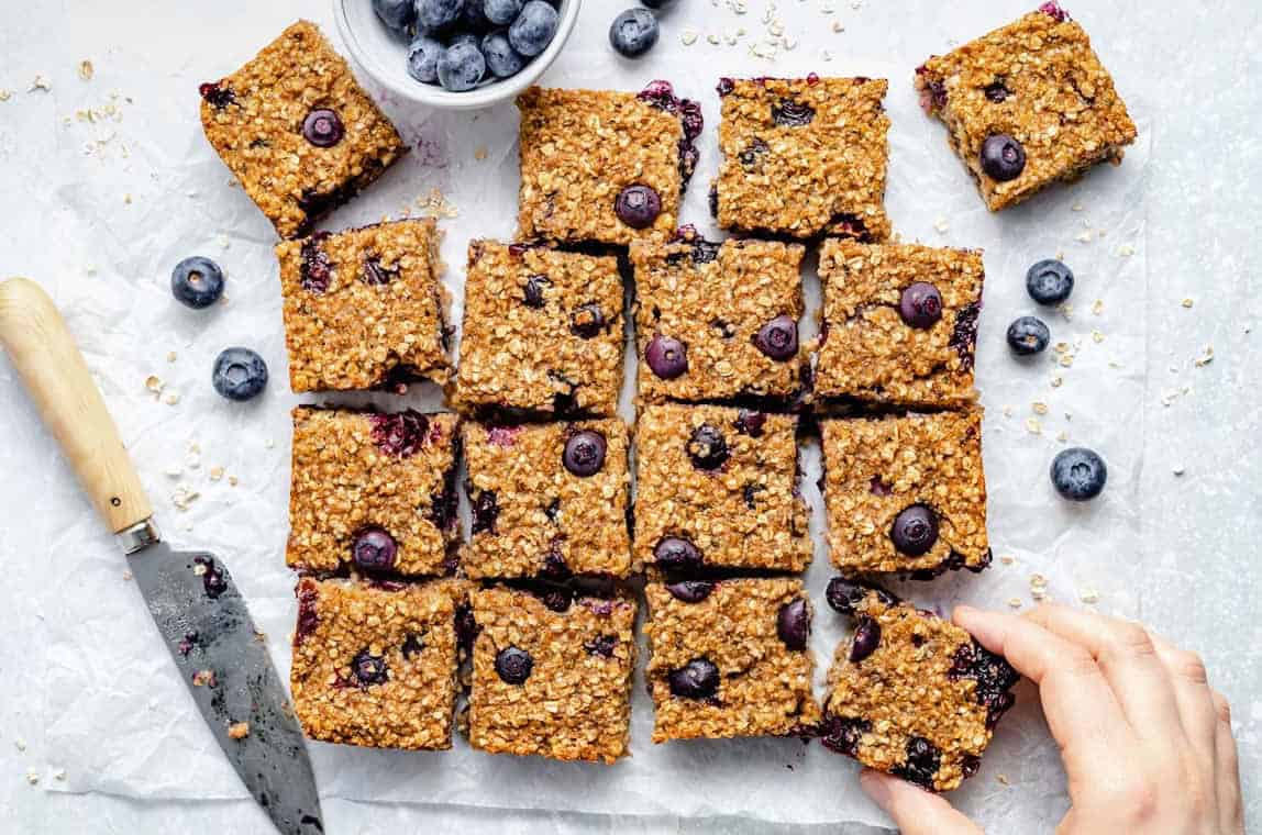 Blueberry breakfast bars on a counter.