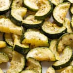 roasted zucchini on a baking sheet