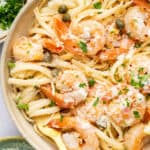 Overhead view of easy shrimp scampi recipe in bowl with fork
