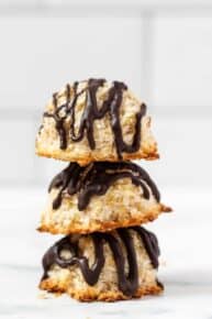 Stack of 3 quinoa coconut macaroons with chocolate drizzle