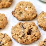 Vegan oatmeal chocolate chip cookies with sea salt sprinkled on top.