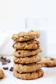 Stack of vegan oatmeal chocolate chip cookies.