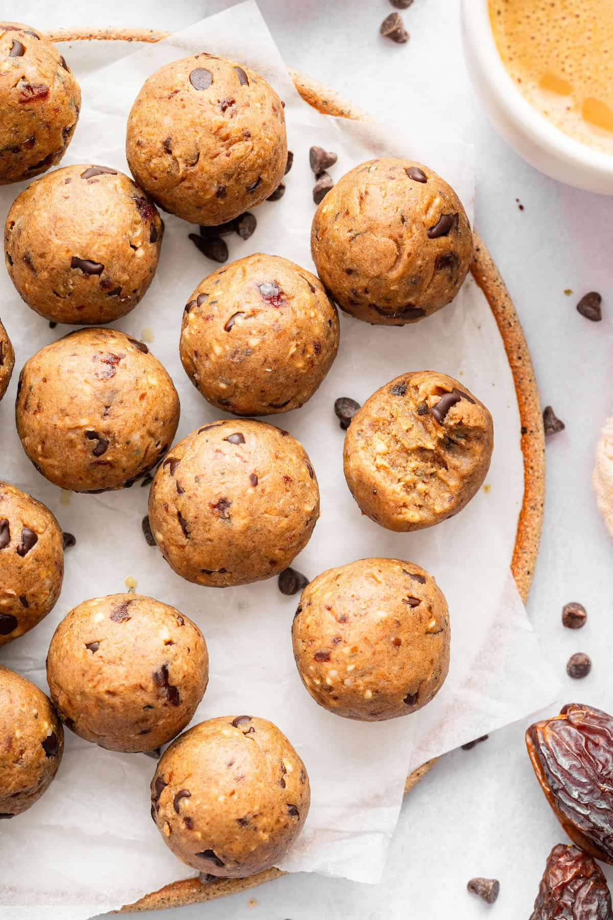 These peanut butter protein balls are easy, no-bake, and irresistibly chewy! They’re a simple and satisfying snack you can prep ahead. Plate of no bake peanut butter protein balls.