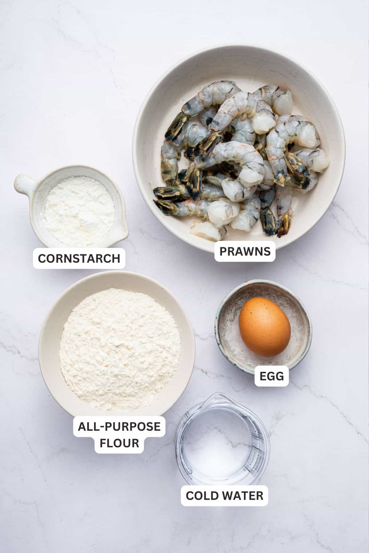 This crispy shrimp tempura is perfectly golden and just as crispy and delicious as the restaurant version. Only six ingredients! Overhead view of ingredients for shrimp tempura