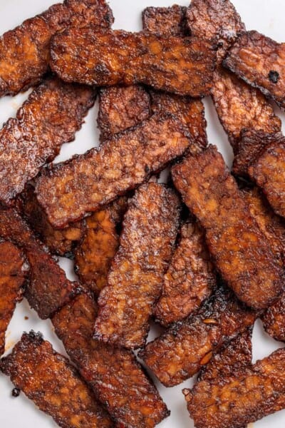 Close up of crispy tempeh bacon to show the texture.