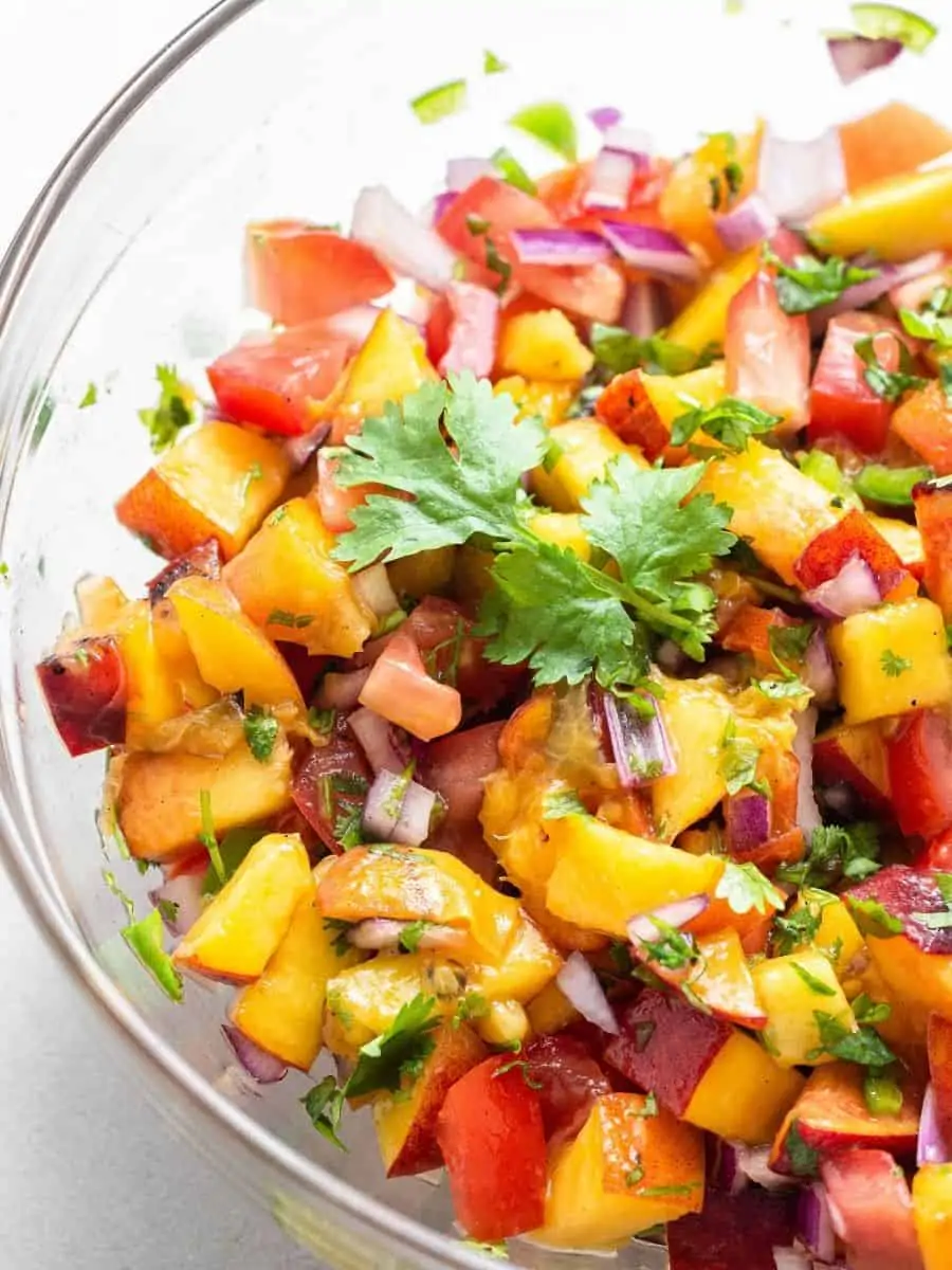Overhead view of peach salsa in bowl