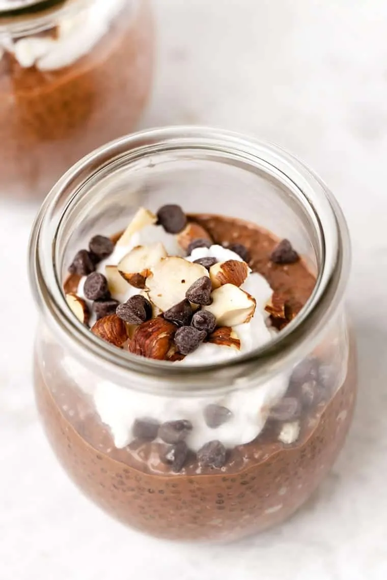 Learn to make chia seed pudding in 6 amazing flavors! These quick and easy recipes are great for breakfast or enjoy them as a balanced snack. Chocolate chia pudding in a jar.